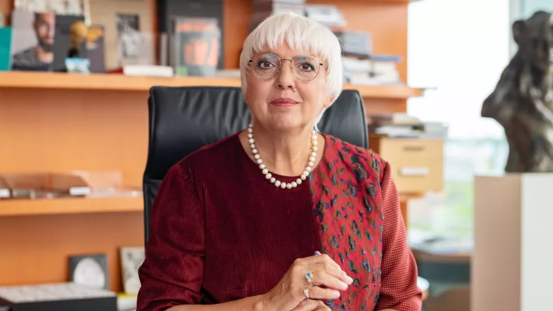 Minister of Culture Claudia Roth sits at a desk