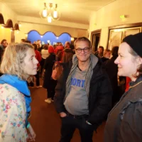 Guests in conversation in the foyer of HAU 1 shortly before the film premiere